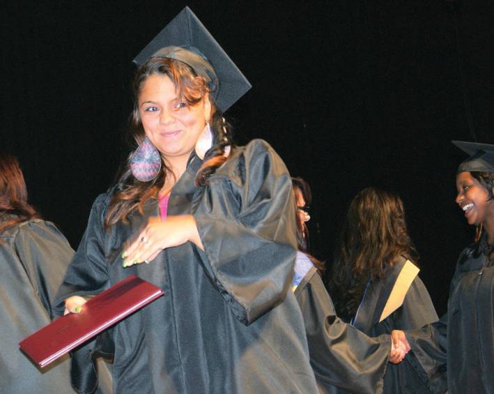 SMILE FOR THE CAMERA: Congratulations to Brianna Raposa who received her diploma in medical billing and coding.