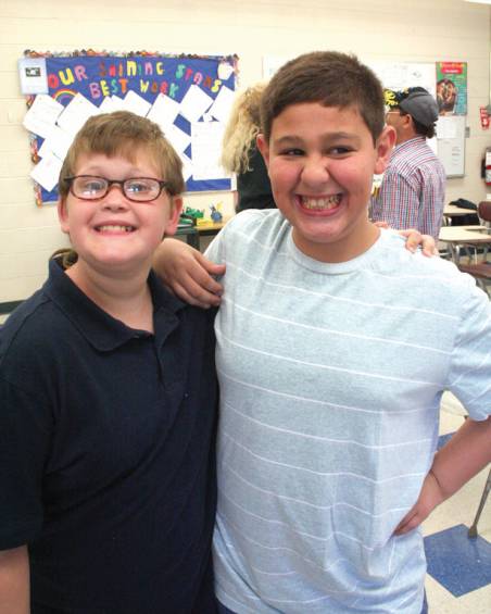 Steven DeSantis and Dominick Tucciarone are all smiles after they presented to family, teachers and classmates.