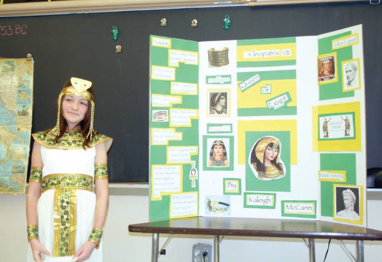Kaleigh McCann shows off her display board on Cleopatra VII.