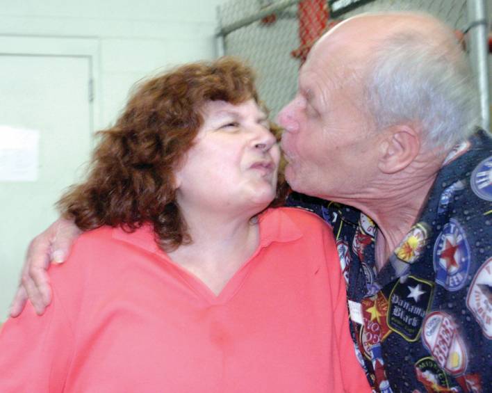 PUCKER UP: Richard Bert Gough and Susette Pastore have been together for nearly four years and recently got engaged. In fact, they met at the Patterson Building. &ldquo;She&rsquo;s very nice and she&rsquo;s very good to me,&rdquo; said Richard, while Susette said, &ldquo;He&rsquo;s handsome, he&rsquo;s nice to me, and he&rsquo;s going to marry me.&rdquo; Further, she&rsquo;s looking forward to going shopping for her wedding gown. &ldquo;I want a straight one with a stripe on the bottom,&rdquo; she said, &ldquo;and I want to see him in a tuxedo.&rdquo;