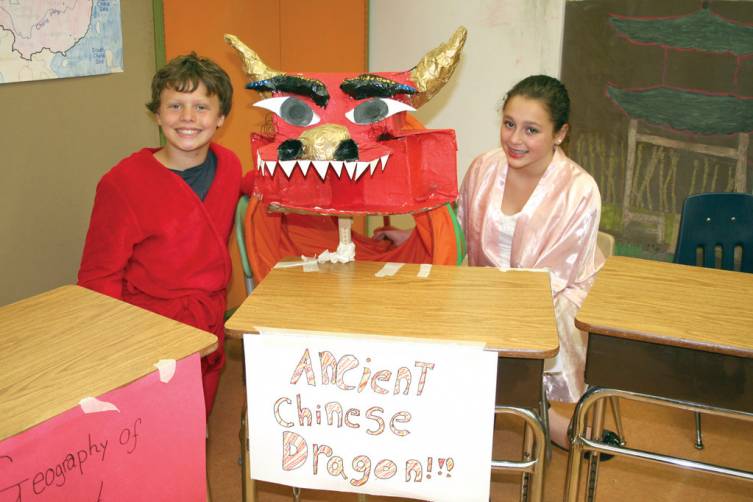 WATCHING OUT FOR DRAGONS: Benjamin Meunier and Adriana Aceto introduce guests to the ancient Chinese dragon that was an icon typically seen in China.