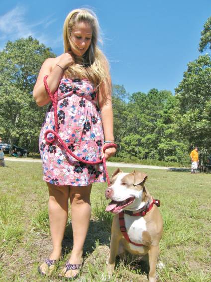 A DAY IN THE PARK: Lauren Fontaine-Greenless of Warwick poses with her pit bull, Izzy.