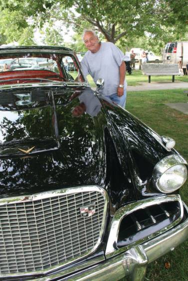 LIKE THE DAY IT FIRST SOLD: Ron Bouvier and his 1957 Studebaker Golden Hawk.