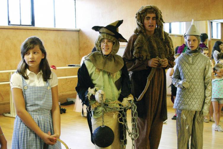 FAMOUS QUARTET: Dorothy, the Scarecrow, Cowardly Lion and Tin Man get ready to head to Oz. They are, from left, Kayley Sullivan, age 13; Nathaniel Savage, 13; Aidan Perry, 16 and    Brian Roque, 14.