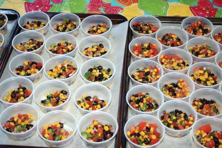 PLENTY OF SNACK TO GO AROUND: The students in the Family and Consumer Sciences II classes at West cooked corn and black bean salsa for Friday afternoon's lunch.