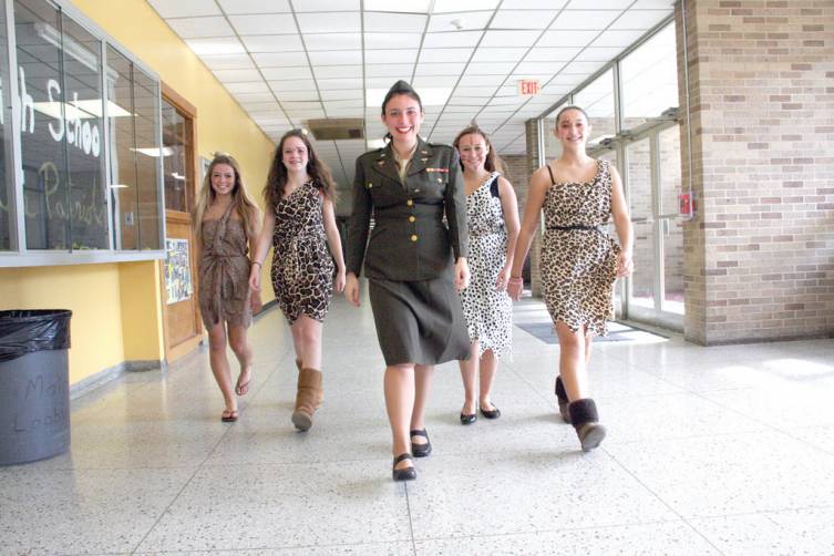 DECADES DAY: Tuesday was &ldquo;decades day,&rdquo; and Casey Adams wore the uniform of her late aunt Rita Rominski, who served as a nurse in World War II. The cave girls from left are: Megan Wilks, Emily Degnan, Maddie Tyrell and Lauren Wade.