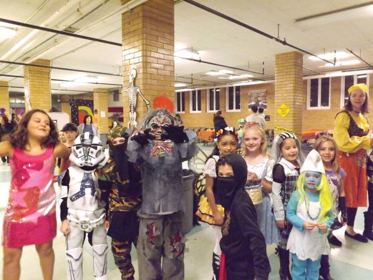 BEWARE THESE GHOULS: Dutemple students show they know how to do Halloween with the right costumes and right attitudes.
