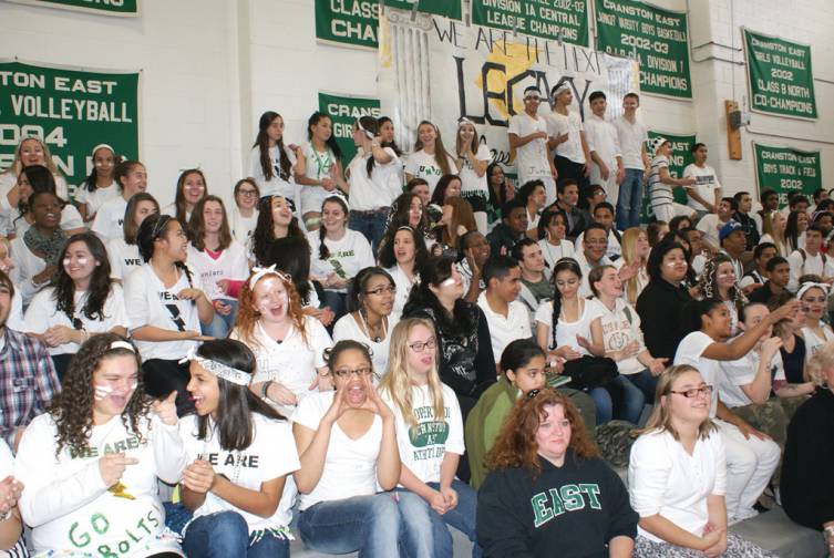 JUNIORS JUMPING: Each class during the Pep Rally wore different colors to represent their grade level. Pictured are members of the East Class of 2014.