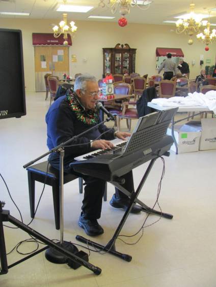 John Scotti, an organist, provided a holiday musical backdrop for last week&rsquo;s annual Christmas Party.