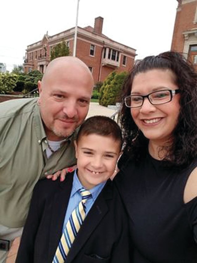 A FAMILY DURING HAPPIER TIMES: Chris Campagnone, his son, Anthony, and Anthony&rsquo;s mom, Diana D'Ambrosio, are pictured at Anthony&rsquo;s confirmation ceremony last year.