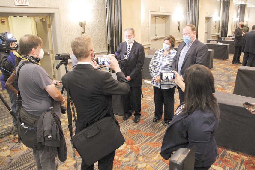 IN THE SPOTLIGHT: Senate President Dominick Ruggerio, Sen. Maryellen Goodwin and Senate Majority Leader Michael McCaffrey answer questions from the news media following Friday night&rsquo;s Senate Democratic Caucus, where both Ruggerio and McCaffrey were reelected to their positions for the upcoming session. Goodwin was named to post of majority whip. (Warwick Beacon photos)