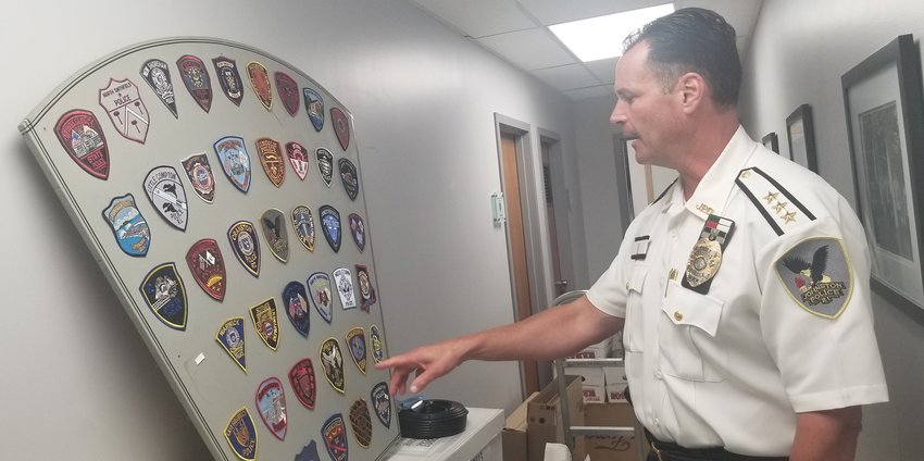 EVERY DEPARTMENT: Last year, Johnston Police Chief Joseph P. Razza referred to a collection of patches from every department in the Ocean State as he discussed a new program aimed at equipping all of Rhode Island&rsquo;s front-line police officers with body-worn cameras. Razza's death was announced Friday, Sept. 29, 2023. He was 54 years old.