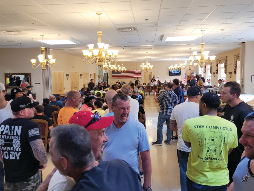 UNION JOBS: More than 100 members and leaders of local trade unions attended the  public hearing in July, voicing support for the proposed six-story retail distribution facility.  The unions hope construction of the facility will provide work for their members.