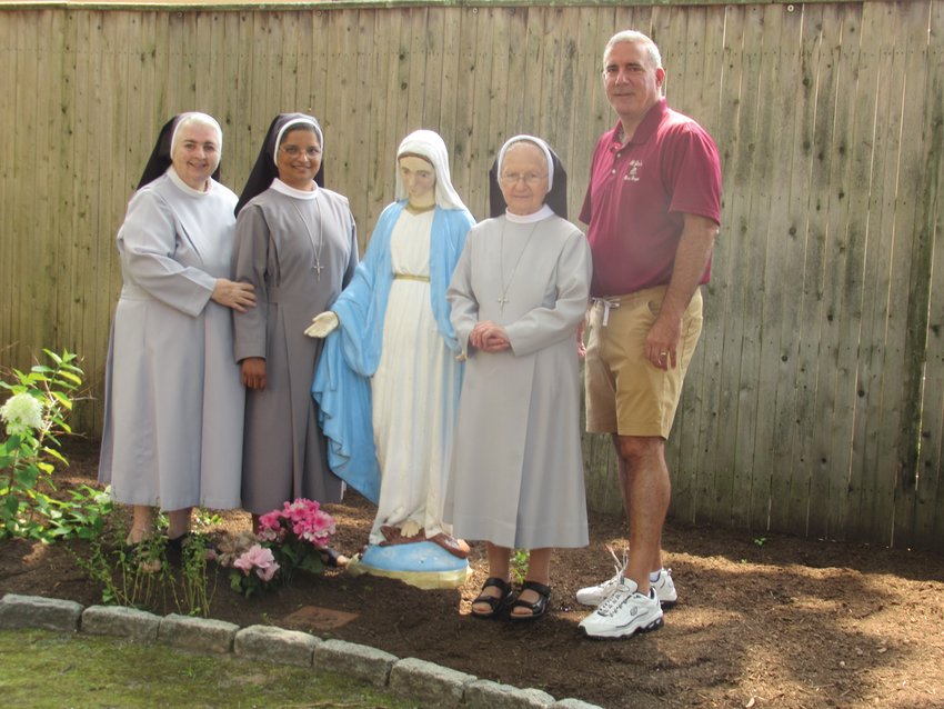 SPECIAL STAFF: Saint Rocco&rsquo;s Church Sisters Donna, Marie Antoinette and Daisy, who will all play a huge part in the upcoming feast and festival, join Church Friends Association president Ralph Ciunci in the parish&rsquo;s beautiful St. Francis Garden after a meeting Sunday morning.