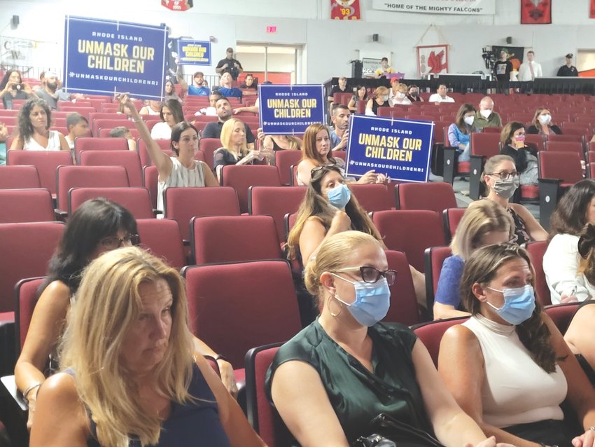 TWO SIDES: Parents packed the Cranston High School West auditorium for a public hearing on a mask mandate for the city&rsquo;s school system.