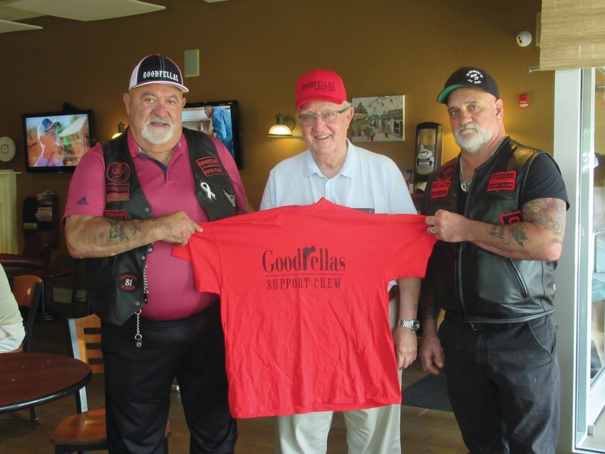 GENEROUS GUY:&nbsp; Last year, Bruno Ramieri, center, held a special T-shirt he received from Goodfellas Motorcycle Club treasurer Cal Calabro, left, and president Gene Benedetti as thanks for his pledge to match up to $20,000 raised through the fifth annual Goodfellas Motorcycle Run. Ramieri has offered to do the same for this year&rsquo;s run.