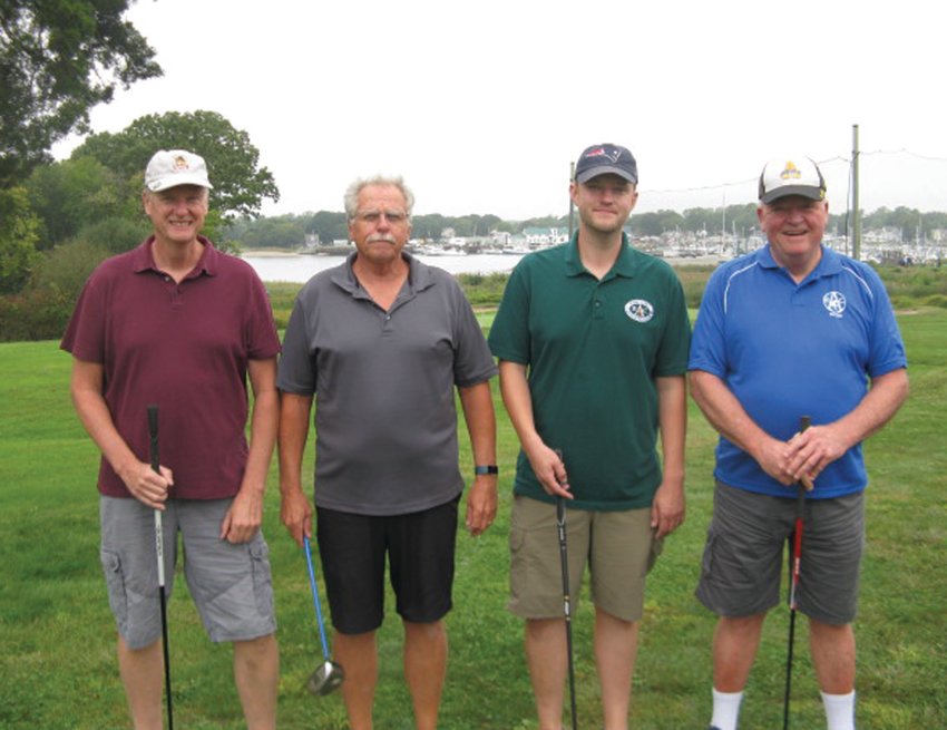 FIRST FOURSOME: This is one of 18 groups that played in the Albert &ldquo;Cookie&rdquo; Memorial Golf Tournament and received a personalized photo. The foursome includes: Tom Horton, Mike Horton, Mike Horton Jr. and Joe White.