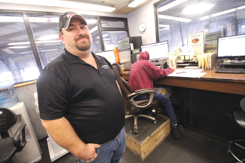TERMINAL WHEELHOUSE:&nbsp; Ryan Roche of DL Terminals in Cranston is seen in the company terminal, where he can be found most early morning hours scheduling the day&rsquo;s pickups and deliveries across Connecticut, Massachusetts and Rhode Island.