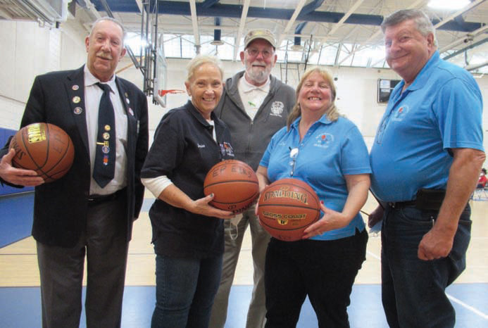 STEVE&rsquo;S SUPER STAFF: Steve Lagesse (left), long-time State Director for the RI Elks Annual Hoop Shoot, is joined by Lodge 2337&rsquo;s Shoot Director Janice Godfrey, State Trustee David Seel, Exalted Ruler Lucy Fontaine and her husband Emile Fontaine during last Saturday&rsquo;s East Providence Elks Shoot.