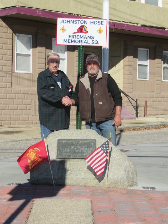 MEMORIAL MEN: Retired Johnson Fiore Department Chief Alan Zambarano (left) issues a special thank you to Jerry St. Angelo for upgrading the Johnston Hose Company No. 1 Memorial Square which was first dedicated back on May 30, 1961.