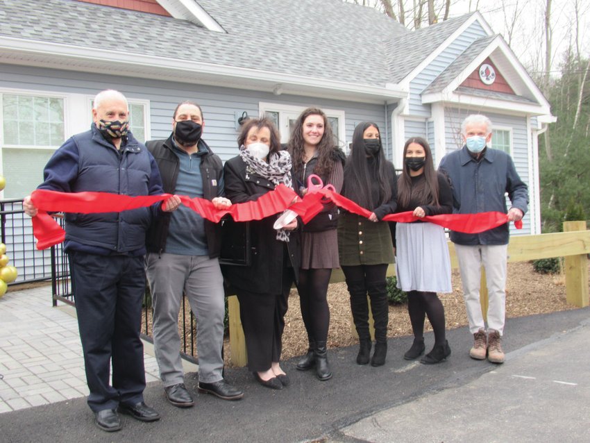 GRAND GROUP: Among the people who took part in the Grand opening of Strawberry Fields Early Learning Academy are, from left: Mayor Joseph Polisena, Owner Dr. Jessica DiRocco, her husband Daniel DiRocco, grandparents Gregory and Janice Mangiante, Director Kennedy Vescera and Education Coordinator Arionna Silva.