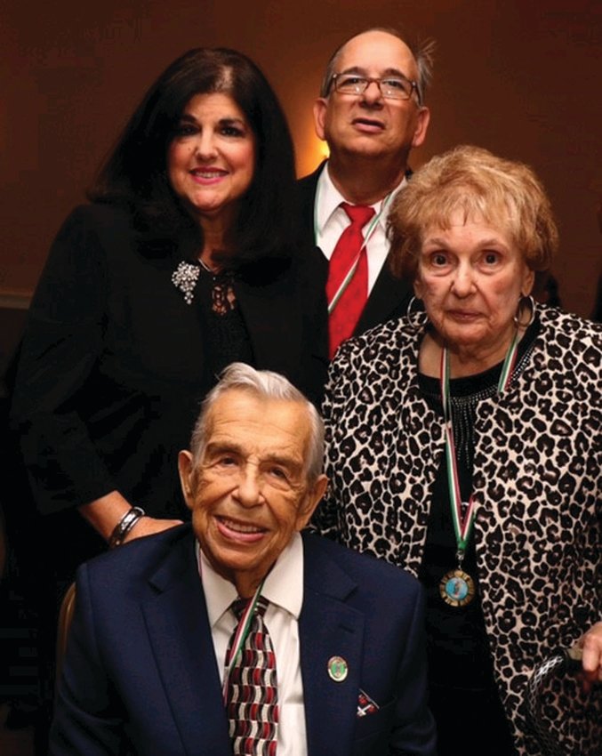 FAMILY FIRST: Joseph &ldquo;Joe&rdquo; Spremulli, his wife Eleanor and son Louis Spremulli and his wife Carla Spremulli are all smiles during the special appreciation dinner for the soon-to-be 90-year-old icon.