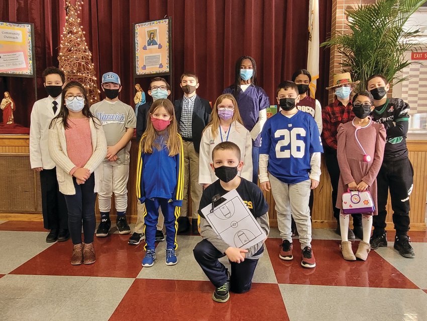 Sixth and second grade students at Saint Rocco&rsquo;s School dressed for Career Day to help kick off this year&rsquo;s Catholic School Week at the Johnston school. (Sun Rise photo by Rory Schuler) CSW career day