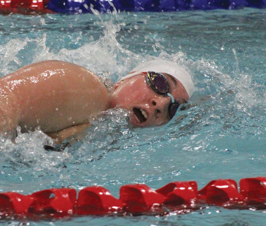 MAKING A SPLASH: Pilgrim  senior Kaylee Collins  competes against Mount  St. Charles last week at the  Woonsocket YMCA.  Collins finished her final  season strong, taking second  place in both the 200  and 500 yard freestyle  events for the Pats.