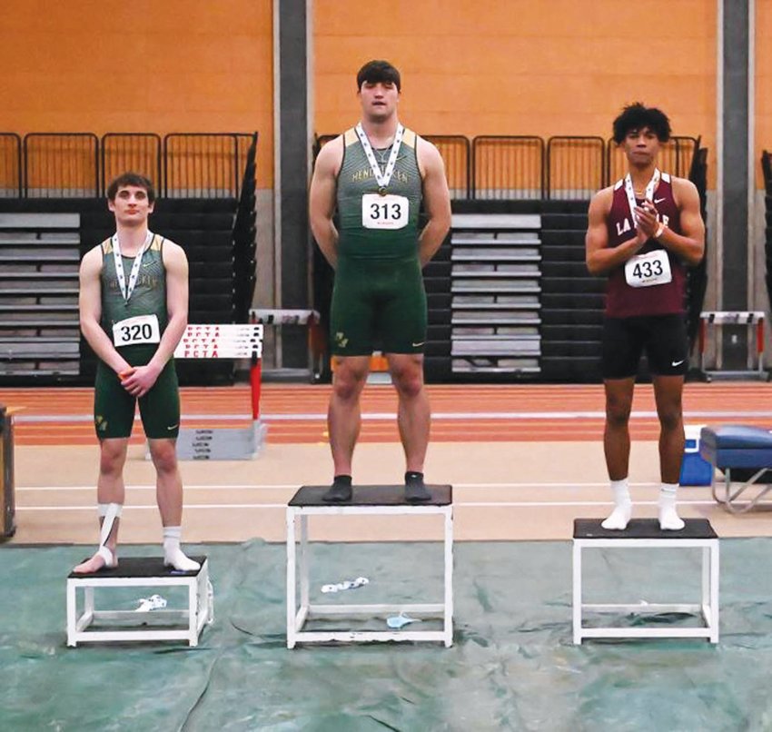 TOP OF THE PODIUM: Bishop Hendricken&rsquo;s Brandyn Durand (center) after wiinning the 300 meter dash at last  week&rsquo;s indoor track state championships in Providence.