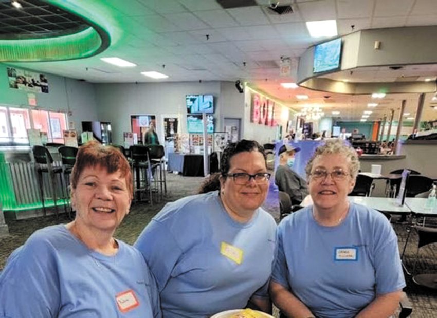 COZ CHICKS AVOID THE GUTTERS: Robin Gervais, Celia Hernandez and Grace Swinksi from the Cranston Family Center reenergize at the bowling fundraiser. (Photo courtesy Grace Swinski)