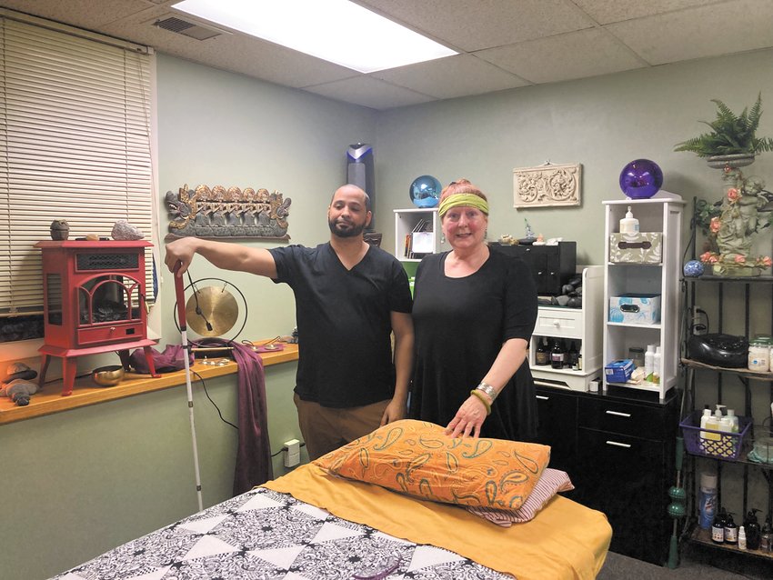 READY TO SERVE: JR is a licensed massage therapist and, while he is visually-impaired, he is looking forward to giving back to the community. With him is Cheryl D&rsquo;Itri, owner of It&rsquo;s Your Body&rsquo;s Symphony.
