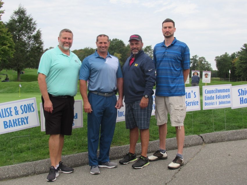SUPER SUPPORTERS: The foursome of Eric Giorgio, David DeCesare, Dave Raposa and Tom Rayko are just one of the many golf groups that enjoy the annual JMCE Memorial Tournament.    Sun Rise photos by Pete Fontaine