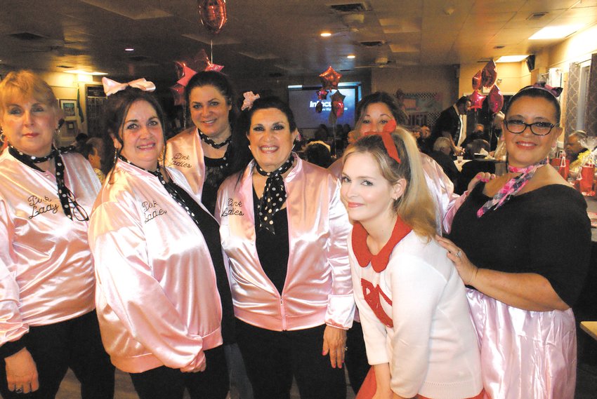 PINK LADIES: Wearing pink to the Sock Hope were the organizers from the St. Mary&rsquo;s Feast Society Ladies&rsquo; Auxiliary. (Left to right) Cheryl Maggiacomo (Trustee), Joanne Marzilli (Trustee), Maria Manzi (President), Debbie Hebert (Treasurer), Marina Peti (as Sandy from Grease) and Lynda Nardolillo (Secretary).