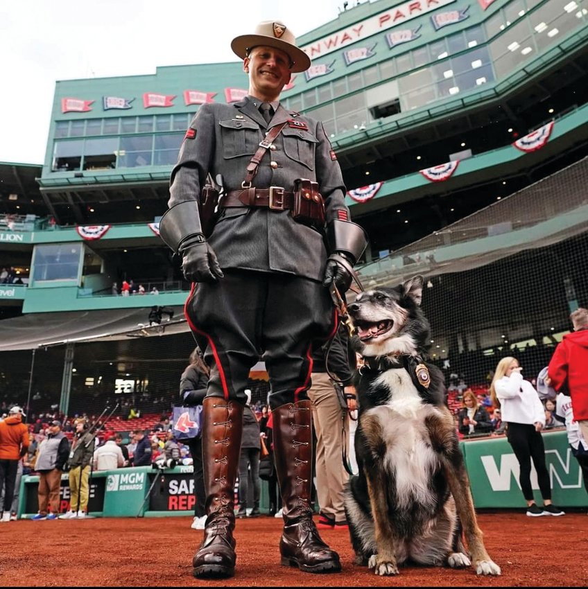 REMARKABLE RESCUE: Ruby and her handler Corporal Daniel O&rsquo;Neil worked out of the Scituate State Police barracks, and served together since 2011. They recently visited Fenway Park in Boston, Massachusetts.