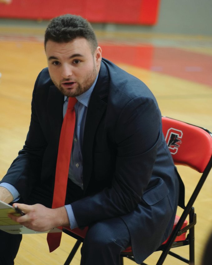 STAYING HOME: Cranston West&rsquo;s James Sweeney during last year&rsquo;s basketball season. The former Falcons junior varsity coach was recently elevated to the varsity program. (Submitted photo)