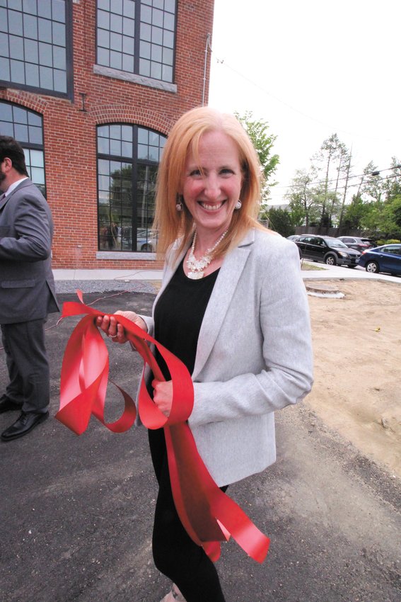 TIED UP AT WORK: Well, Shannon Reyes, manager of the Warwick AAA office was somewhat &ldquo;tied up&rdquo; Monday at the ceremonial opening of the offices at the Sawtooth Building in Apponaug. She oversees a staff of 18.