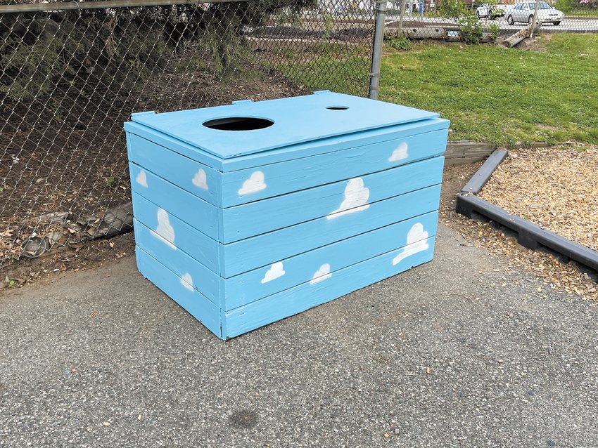 IN THE CLOUDS: For Andrew Garcia&rsquo;s Eagle Scout project, he pursued a Toy Story theme and painted the YMCA&rsquo;s wooden garbage enclosure to look like the wallpaper in Andy&rsquo;s bedroom. (Submitted photo)