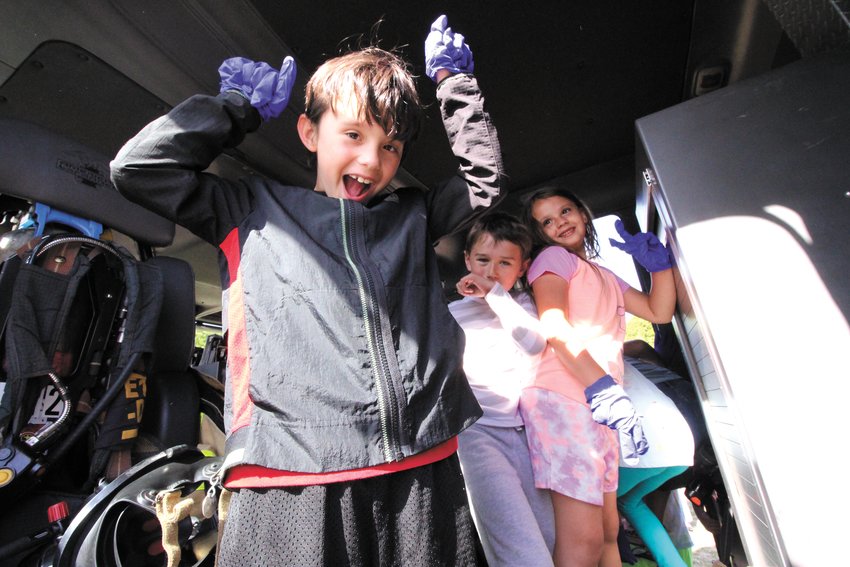 HAMMING IT UP:&nbsp;&nbsp;Students from all of the city&rsquo;s elementary schools got a taste of Christmas and plenty of games and activities at the Warwick Rotary party including, as seen here, having free rein to tour the cab of fire truck. &nbsp;