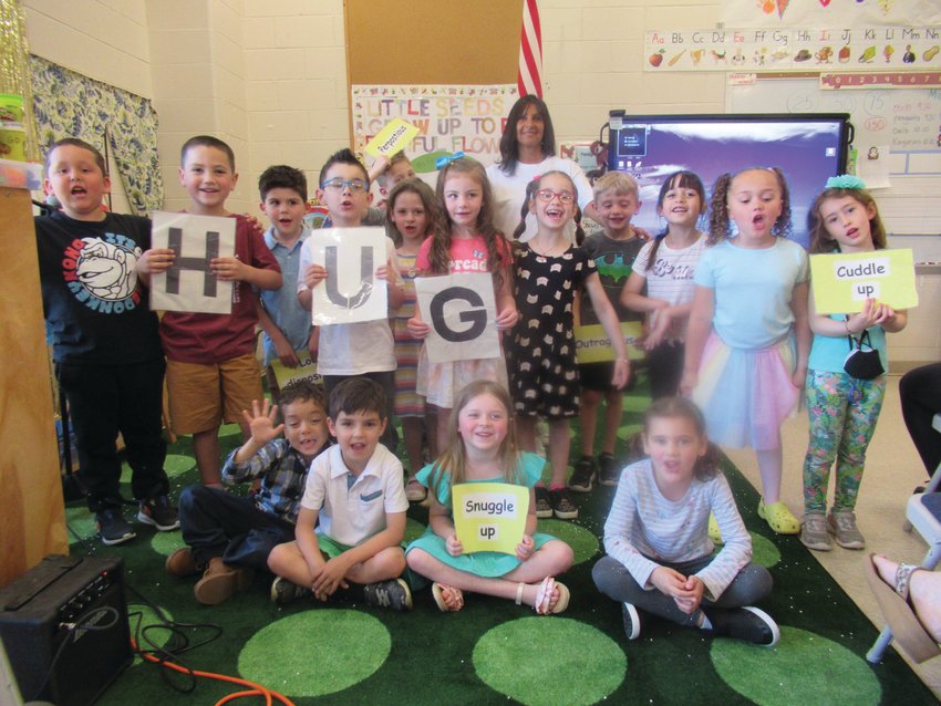 GRECO&rsquo;S GRAND GROUP: ECC Teacher Linda Greco stands behind her all-day kindergarten class that put on an extraordinary event for upwards of 50 people, including proud parents, grandparents, friends and family members.