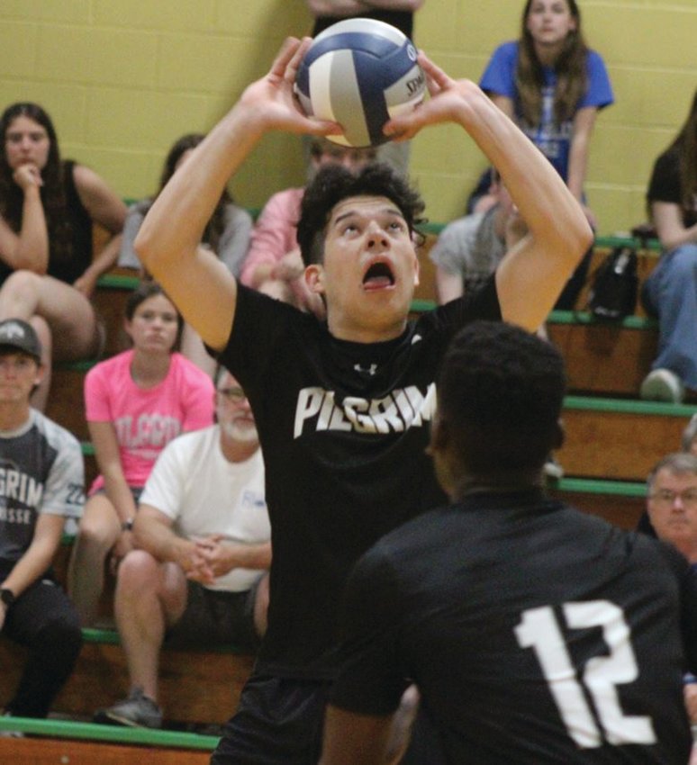 SETTING THE BALL: Azael Alvarez sets the ball at last week&rsquo;s game against North Smithfield/Mount St. Charles.