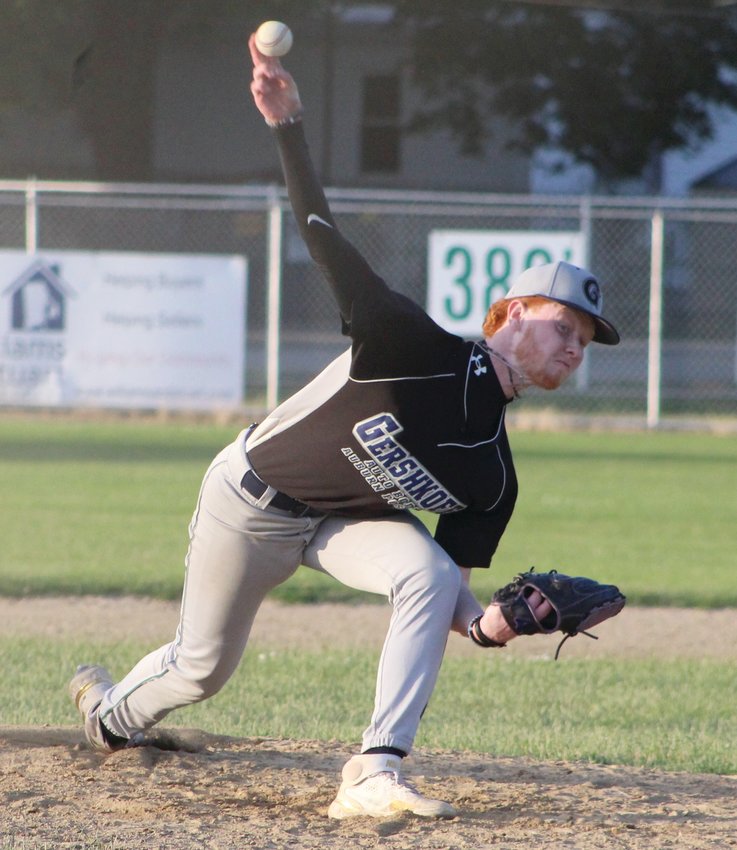 FROM THE MOUND: Matt Winn throws a pitch during a double-header Monday night. Winn&rsquo;s the starting pitcher for Cranston/Johnston based Legion team Gershkoff Auburn Post 20. (Herald photo by Ryan D. Murray)