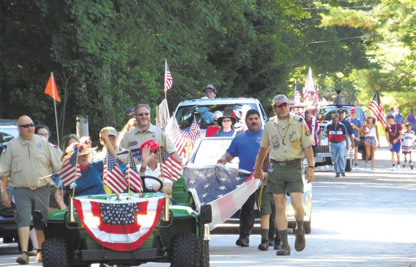 Started 27 years ago, the Warwick Neck Fourth of July parade has become a neighborhood classic that brings out the red, white and blue and lots of decorated vehicles &ndash; even lawn mowers. Susan Dzyacky, who has done so much for the Neck over the years, was this year&rsquo;s Grand Marshal.  More photos are featured on page 6. (Warwick Beacon photos by Kathy Eisemann)