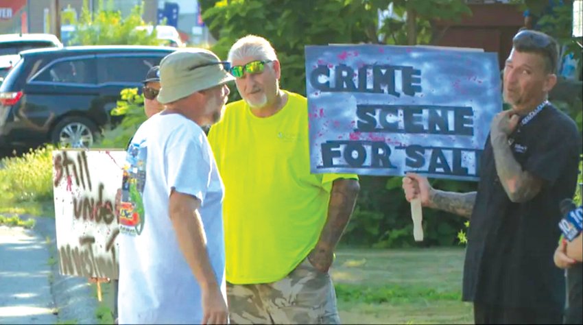 HE HAS A SIGN TOO: David Viens is the father of Dillon Viens, 16, a Johnston resident and student at who died following a &ldquo;shooting&rdquo; at 78 Cedar St. The home is now for sale, and David picketed a recent Open House. He carried signs reading: &ldquo;CRIME SCENE FOR SALE&rdquo; and &ldquo;Open Investigation for SALE,&rdquo; and wanted to ensure potential buyers knew what happened in the house. (Submitted photos)