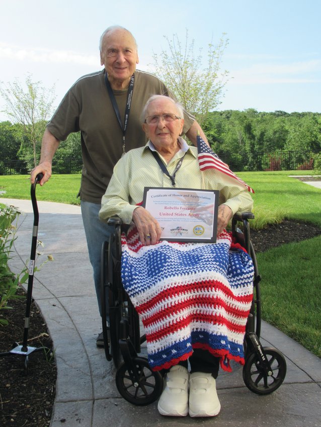 FANTASTIC FRIENDS: Rebello Ferrante (front), who will turn 99 on Sept. 2, is backed by his best buddy Sal DiSanto during the recent ceremony honoring the U.S. Army veteran for his extraordinary service in the US Army.