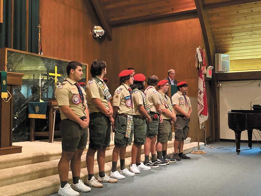CONGRATS FROM THE CITY: Mayor Ken Hopkins congratulates the seven scouts on their achievement of obtaining the Eagle rank. Hopkins was a former scout himself. (Herald photo)
