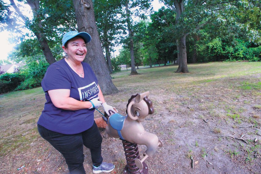 HER DAUGHTER REMEMBERED: Laura Logan felt her daughter&rsquo;s presence as she returned Friday to the playground her daughter made a Girl Scout project more than 22 years ago. (Warwick Beacon photos)