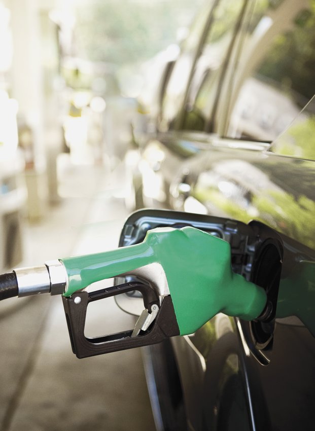 Gas pump in car, close-up