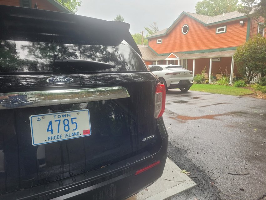 TOWN EMPLOYEE/SENATOR PARKING: A black, four-wheel drive Ford Explorer with a blue and white town license plate sat outside Lombardo&rsquo;s home at 10 Anson Brown &mdash; a small dead-end waterfront street. Next to the Explorer, Lombardo parked his white Jaguar Pace SUV, with &ldquo;SENATE&rdquo; license plates.