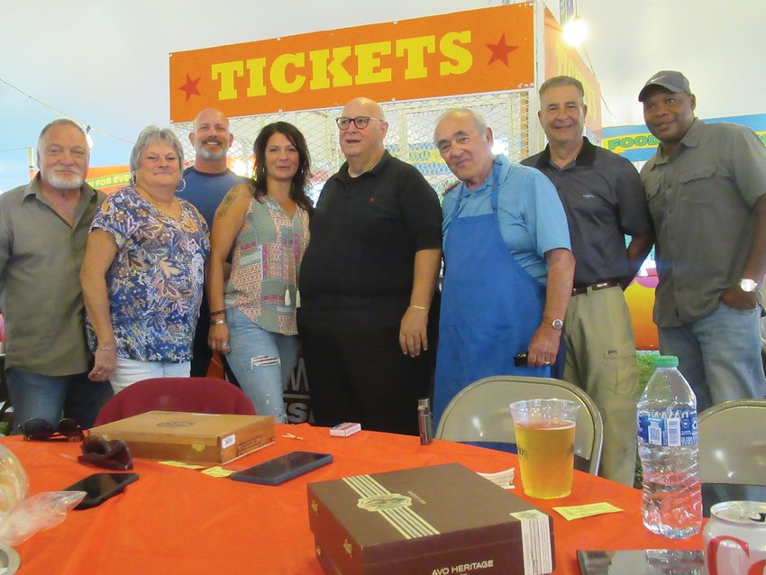 FATHER&rsquo;S FRIENDS: Among the many people who enjoyed Saturday&rsquo;s Steak and Cigar Night at Our Lady of Grace were from left: Ron and Marie Curtis, Jen Burns, Father Peter J. Gower, Joe Grasso, Sen. Frank Lombardo and Marvin Carter.