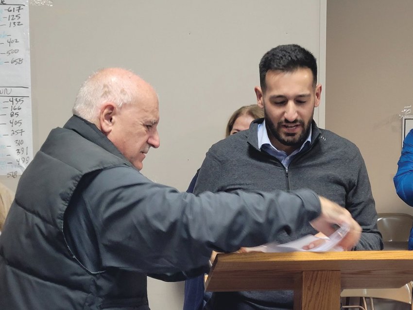 MAYORAL LEGACY: In tears, now outgoing Johnston Mayor Joseph Polisena passed the lectern to his son, Mayor-elect Joe Polisena Jr. after General Election night&rsquo;s victory was clear.